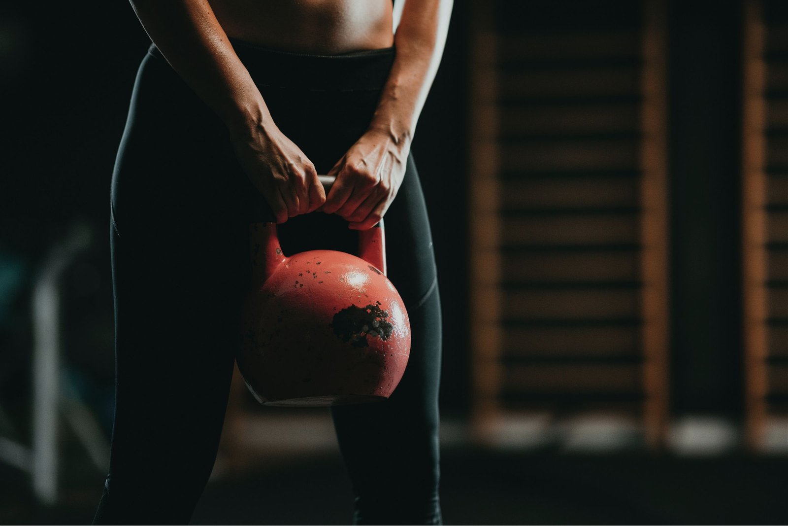 Women with kettlebell.